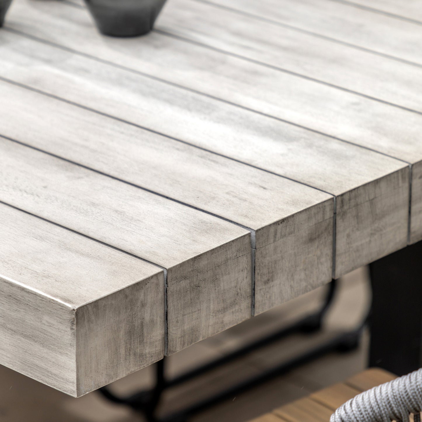 Gallery Garden Taranto 6 Seater Dining Table constructed from grey acacia wood with slatted table top