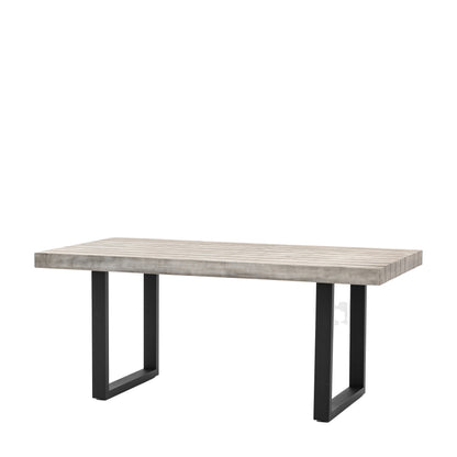 Gallery Garden Taranto Rectangular Dining Table can seat up to 6, and features a grey slatted table top, with black metal legs