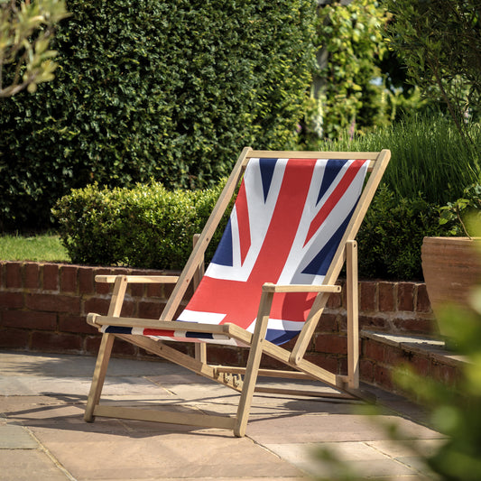 Gallery Garden Deck Chair made from a lightweight but durable acacia wood frame and union jack fabric seat, featuring 3 reclining positions and integrated armrests