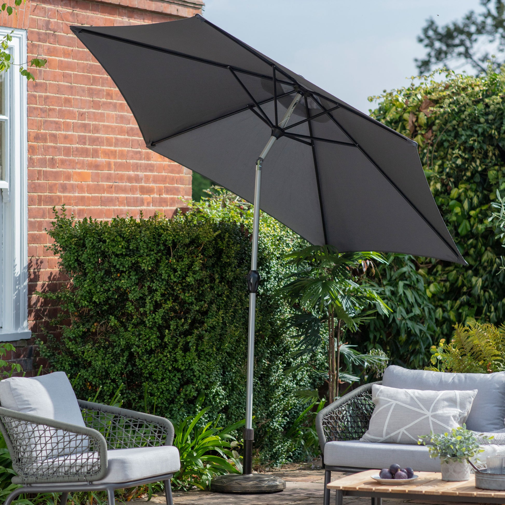 Gallery Garden Vazzano 2.7m Parasol in Grey fabric has an aluminium frame with tile and crank mechanism