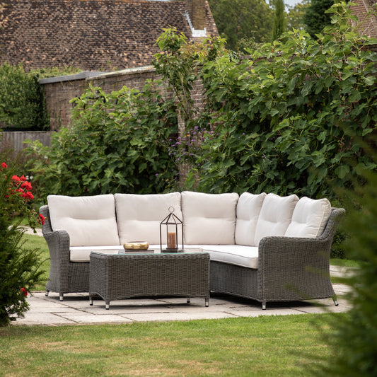 Gallery Garden Windsor Corner Lounge Set comprises of a sectional corner sofa with seat and back cushions, and a matching glass top coffee table