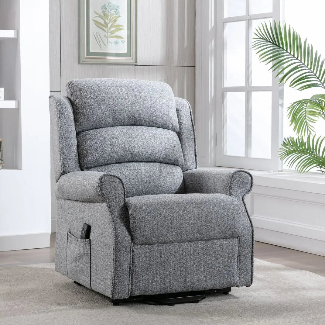 Global Furniture Alliance Andover Riser Recliner Chair upholstered in a plush Grey soft tactile fabric, with piped scroll arm detail and luxurious waterfall back for enhanced comfort and support