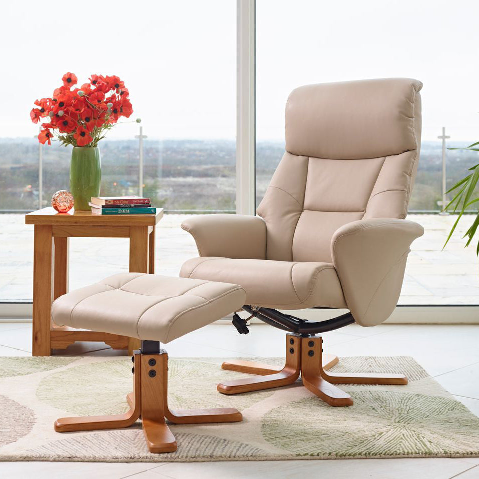 Global Furniture Alliance Marseille swivel and recliner chair in Cafe Latte faux leather fabric, with a matching footstool