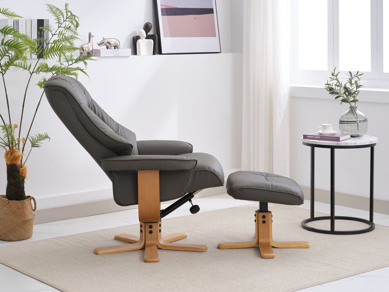 Global Furniture Alliance Sardinia 360 degree swivel and recliner chair in Cinder Leather with a mid oak base