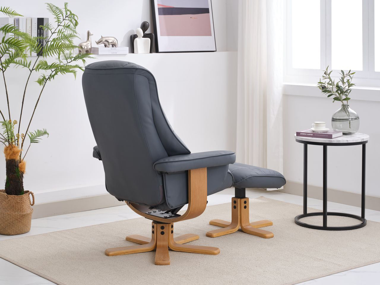 Global Furniture Alliance Sardinia Chair and footstool in Petrol Blue Leather with 360 degree swivel feature and mid oak base