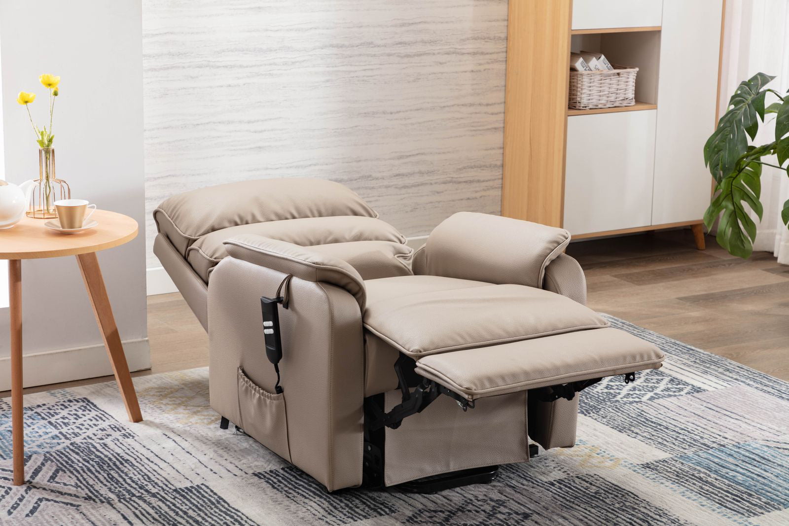 Global Furniture Alliance Valencia Riser Recliner Chair in Pebble Plush Fabric has multiple positions and can be easily adjusted with the remote control