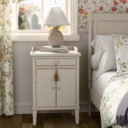 The Laura Annaside Bedside Cabinet from the Annaside range features 1 drawer and 2 doors in a light cream, vintage inspired design