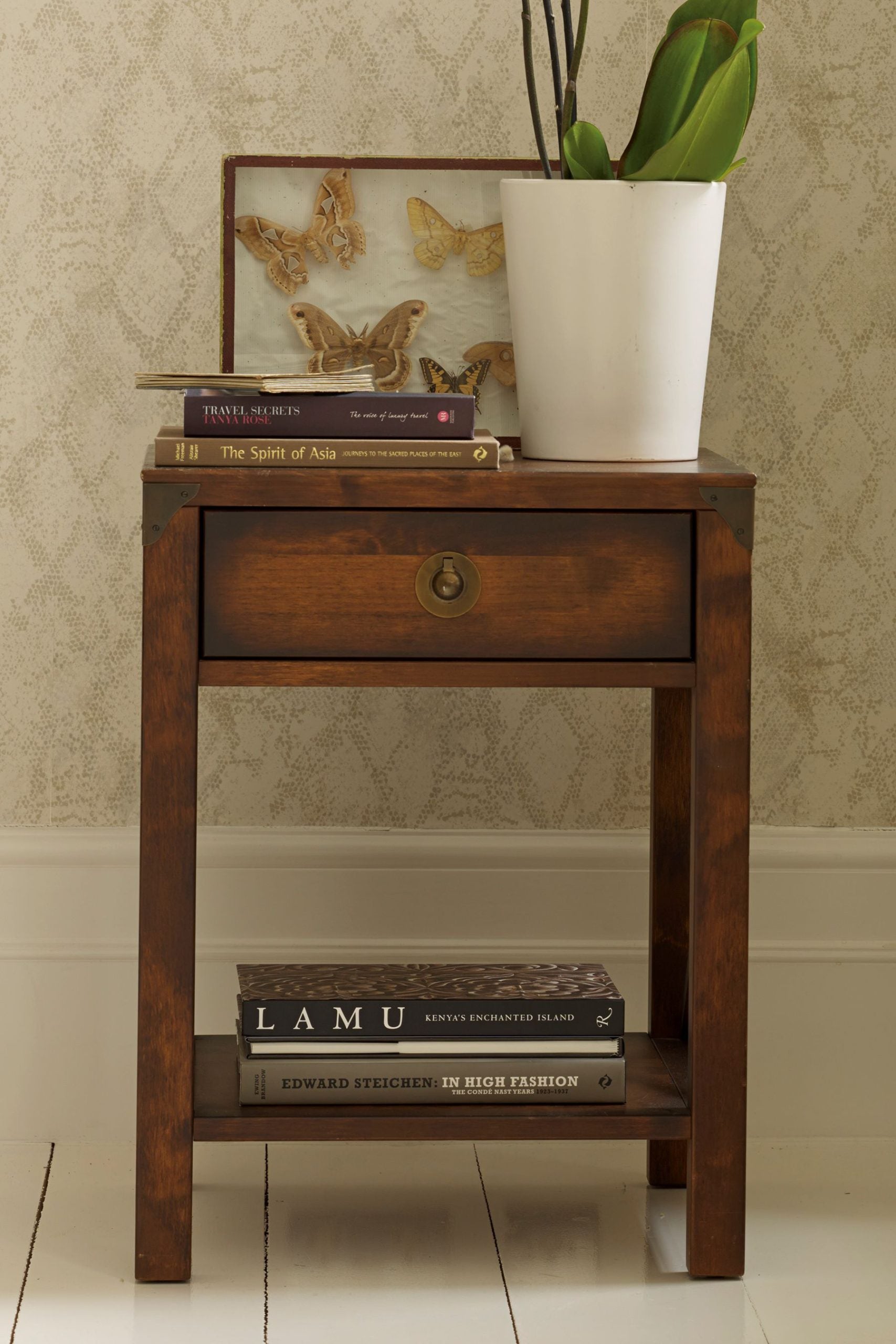 Laura Ashley Balmoral 1 Drawer Side Table in a deep Chestnut coloured birch wood features 1 storage drawer, a lower open shelf and has brass hardware