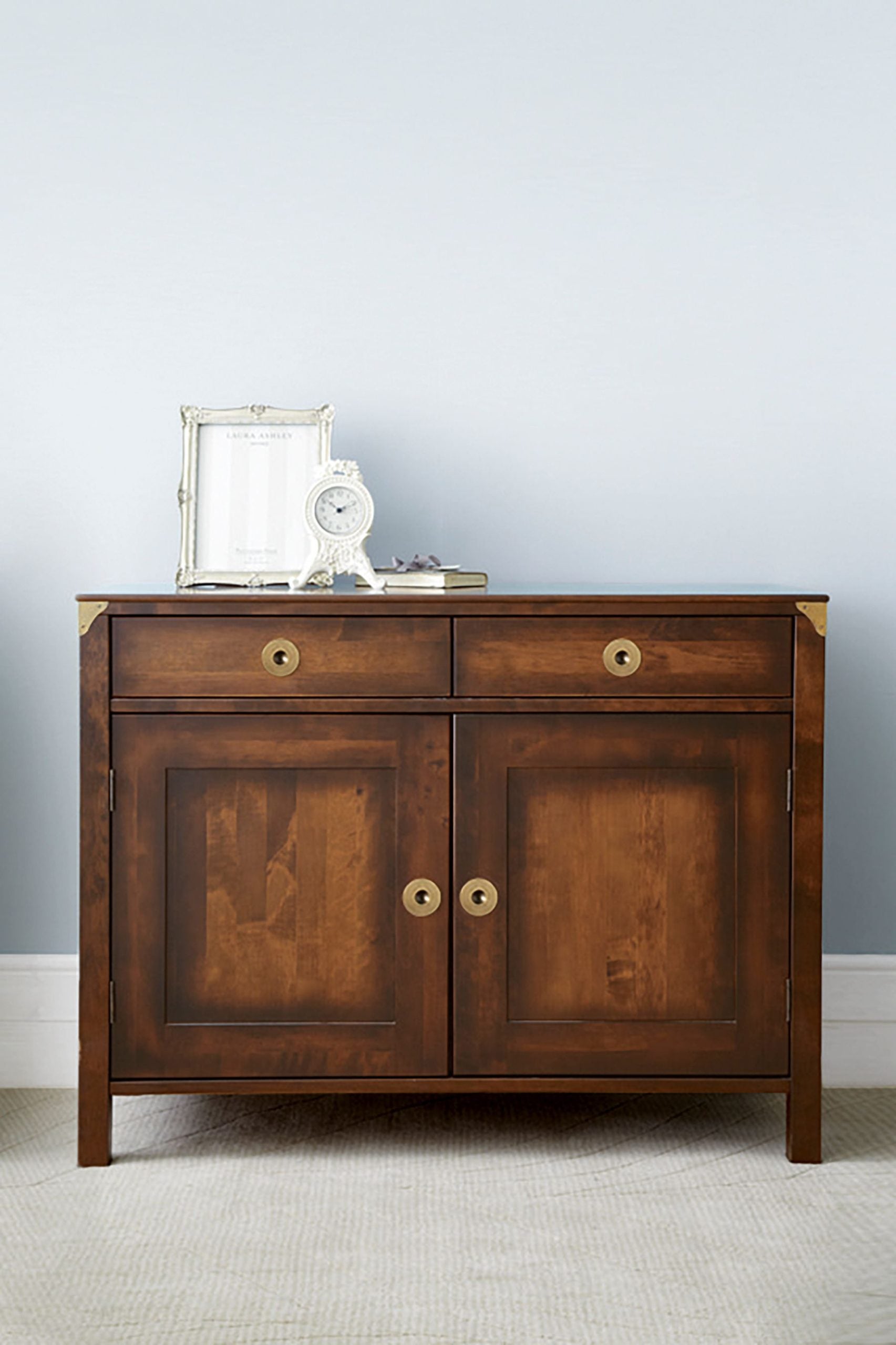 Laura Ashley 2 Door 2 Drawer Sideboard in Chestnut from the Balmoral collection features spacious drawers and cupboard with brass handles and corner bracket detail