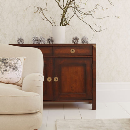 Laura Ashley Balmoral 2 Door 2 Drawer Sideboard in Chestnut features two cupboard doors and two top drawers complemented by brass effect hardware