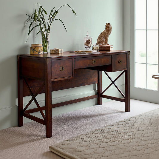 Laura Ashley Balmoral 3 Drawer Desk in Chestnut with cross frame side detailing, 2 side drawers and a centre pull out keyboard tray with brass hardware