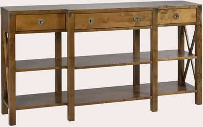 Laura Ashley Balmoral 3 Drawer Triple Console Table in Honey features 2 large shelves and cross frame side detailing, 3 storage drawers and brass hardware