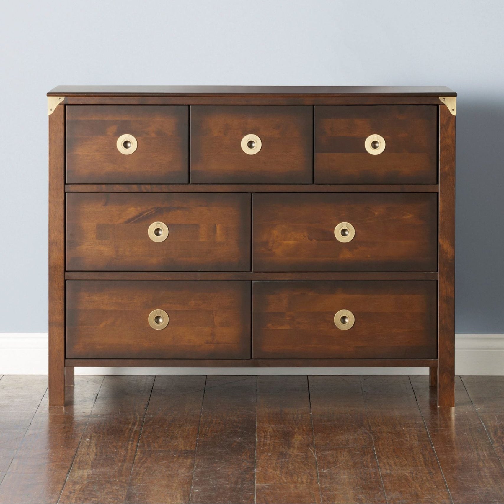 Laura Ashley Balmoral 3 over 4 Drawer Chest in Chestnut features 7 spacious drawers with brass handles, and brass corner brackets to the frame