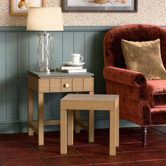 Laura Ashley Braystone nest of 2 square tables crafted from white-washed solid oak, including one table with drawer and light grey sintered stone top