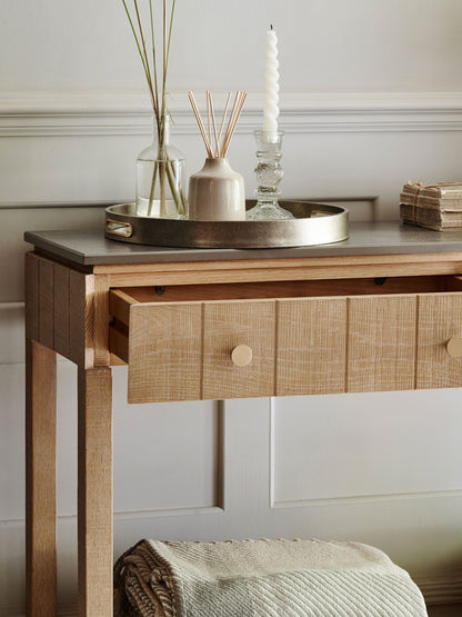 Laura Ashley Braystone Console table with Drawers and Shelf, grey stone top and solid oak frame with a white washed finish and gold coloured drawer handles