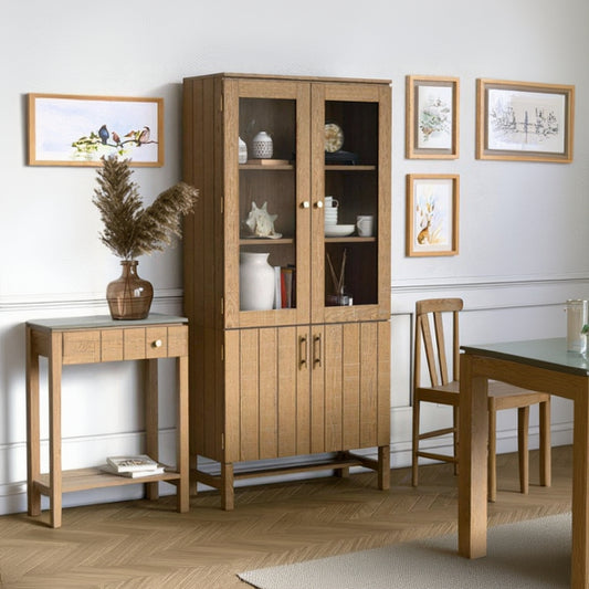 Laura Ashley Braystone glass fronted display cabinet crafted from solid oak with distressed white-washed finish, in a rustic contemporary style