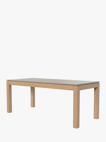 Laura Ashley Braystone fixed dining table featuring white washed oak base and grey sintered stone tabletop
