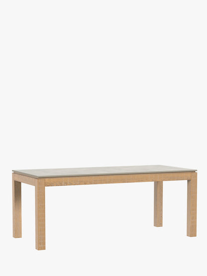 Laura Ashley Braystone fixed 6–8 seater dining table with solid oak frame in white-washed distressed finish and light grey sintered stone top
