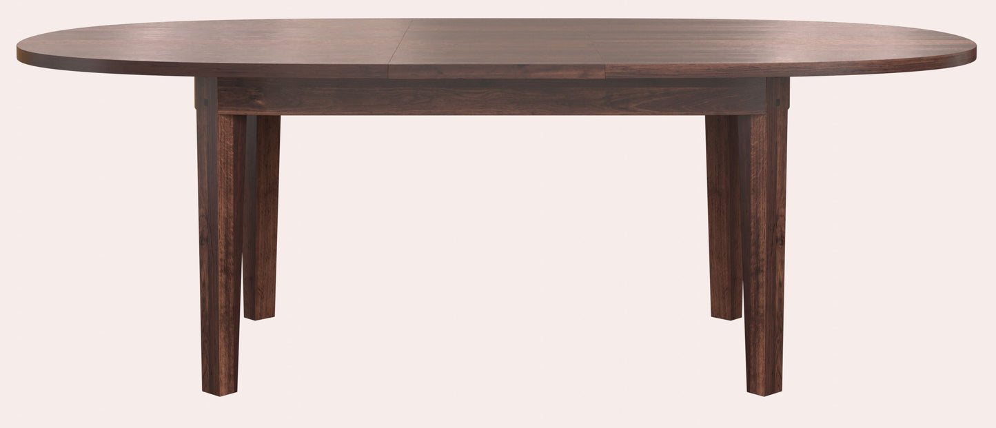 Laura Ashley Garrat oval extending dining table in chestnut finish with solid wood construction and traditional styling.