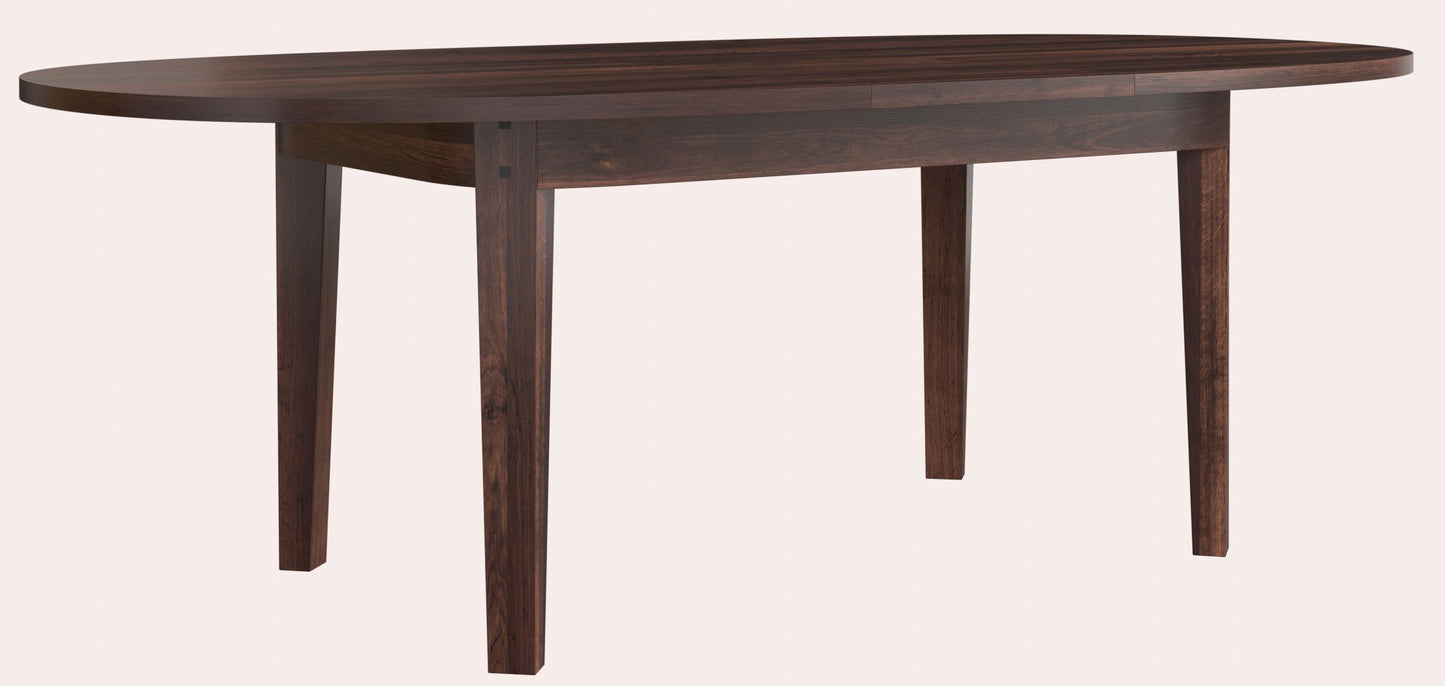 Garrat chestnut oval dining table from Laura Ashley featuring an extendable top and deep chestnut wood tones.