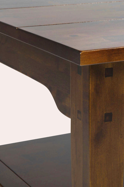 Laura Ashley Garrat Chestnut Rectangular Coffee Table is traditionally crafted from birch wood with rectangular table top and square legs with underneath shelving