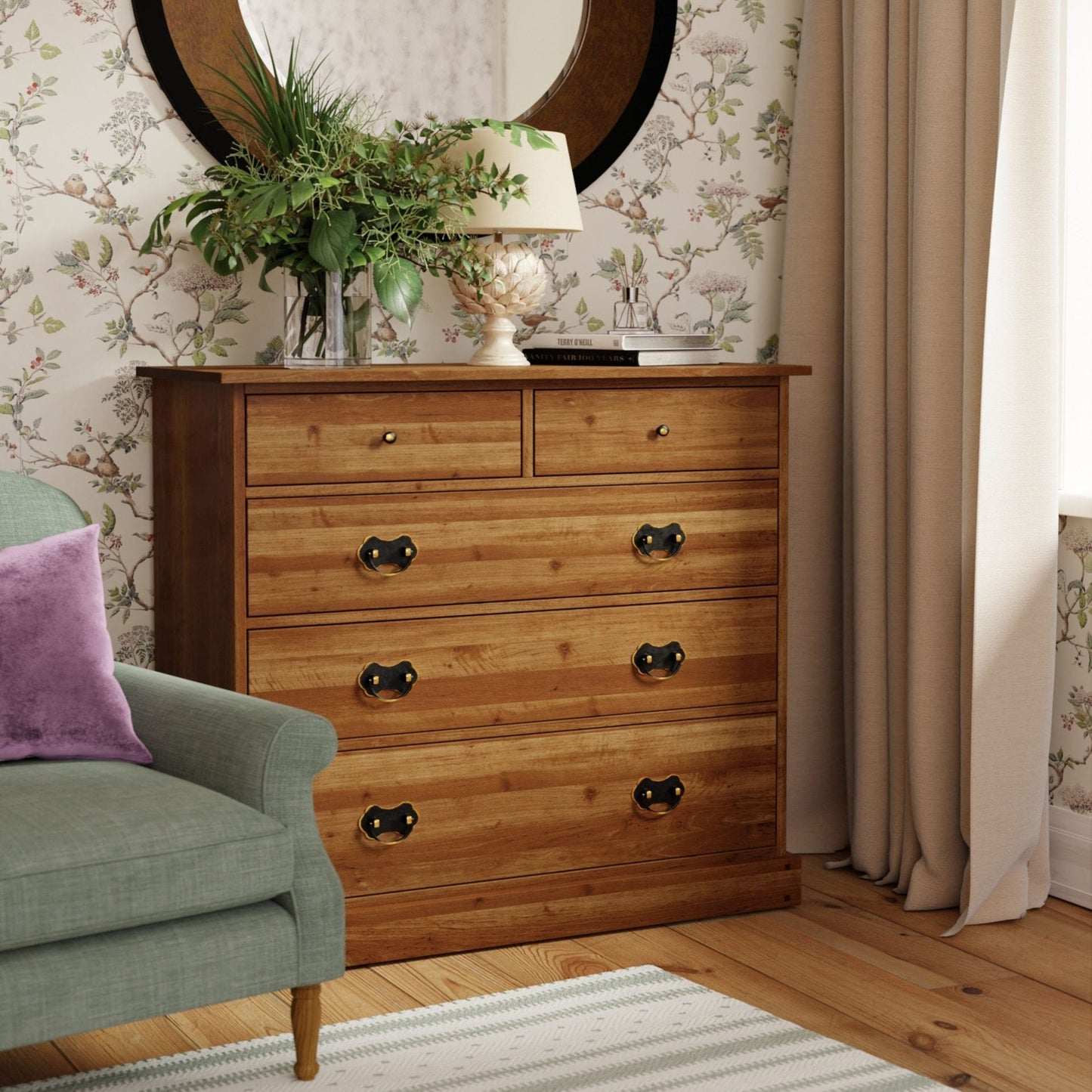 Laura Ashley Garrat traditional wooden chest of drawers with compact top drawers and wide lower drawers in a warm honey coloured finish