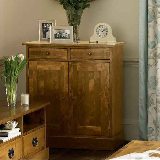 Laura Ashley Garrat Honey 2 Door 2 Drawer Narrow Sideboard crafted from solid birch wood with metal handles