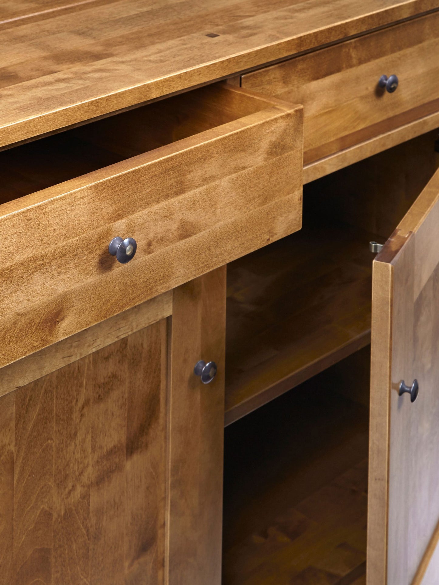 Laura Ashley Garrat Honey 2 Door 2 Drawer Sideboard crafted from solid birch wood in a warm honey colour finish with metal door and drawers knobs