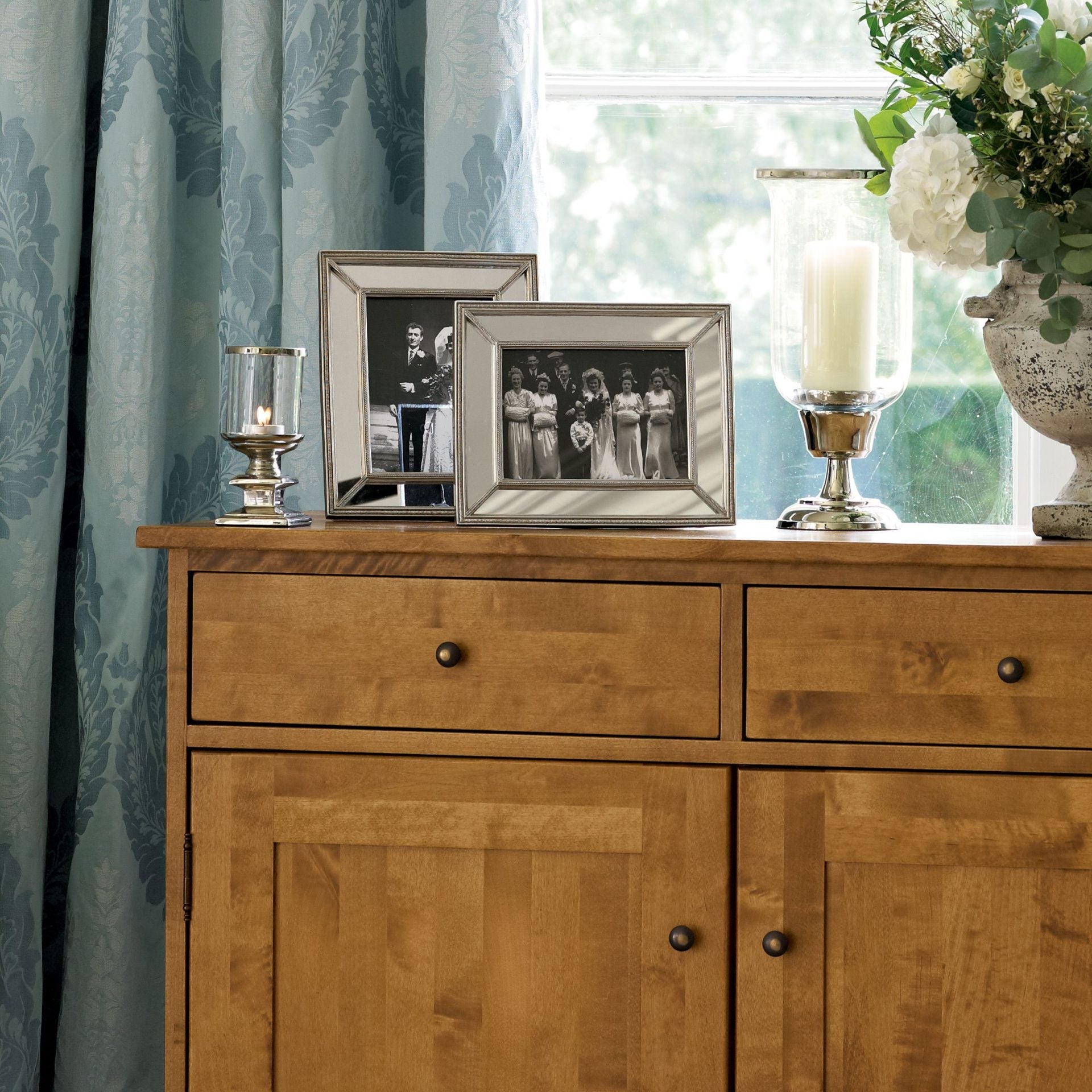Laura Ashley Garrat Honey 2 Door 2 Drawer Sideboard features 2 cupboard doors withy internal shelves and 2 top drawers with metal handles