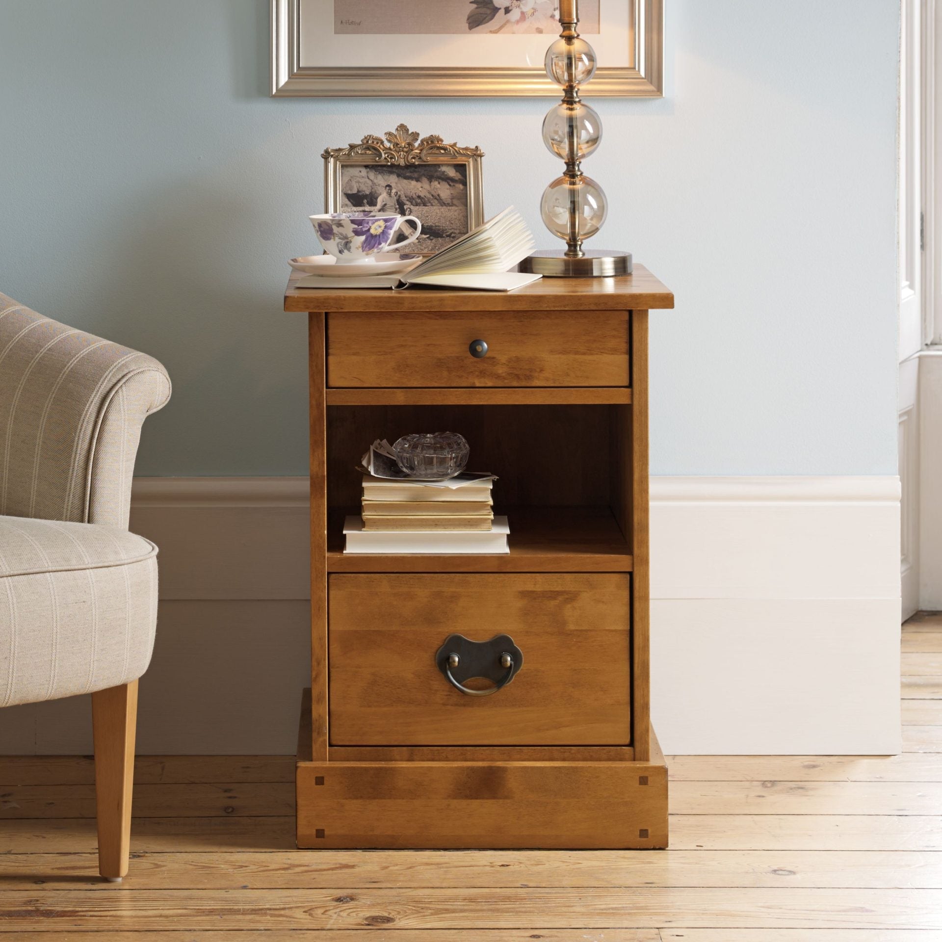Laura Ashley 2 Drawer Side Table with middle shelf, crafted from solid birch wood with antique style metal handles from the Garrat Honey collection