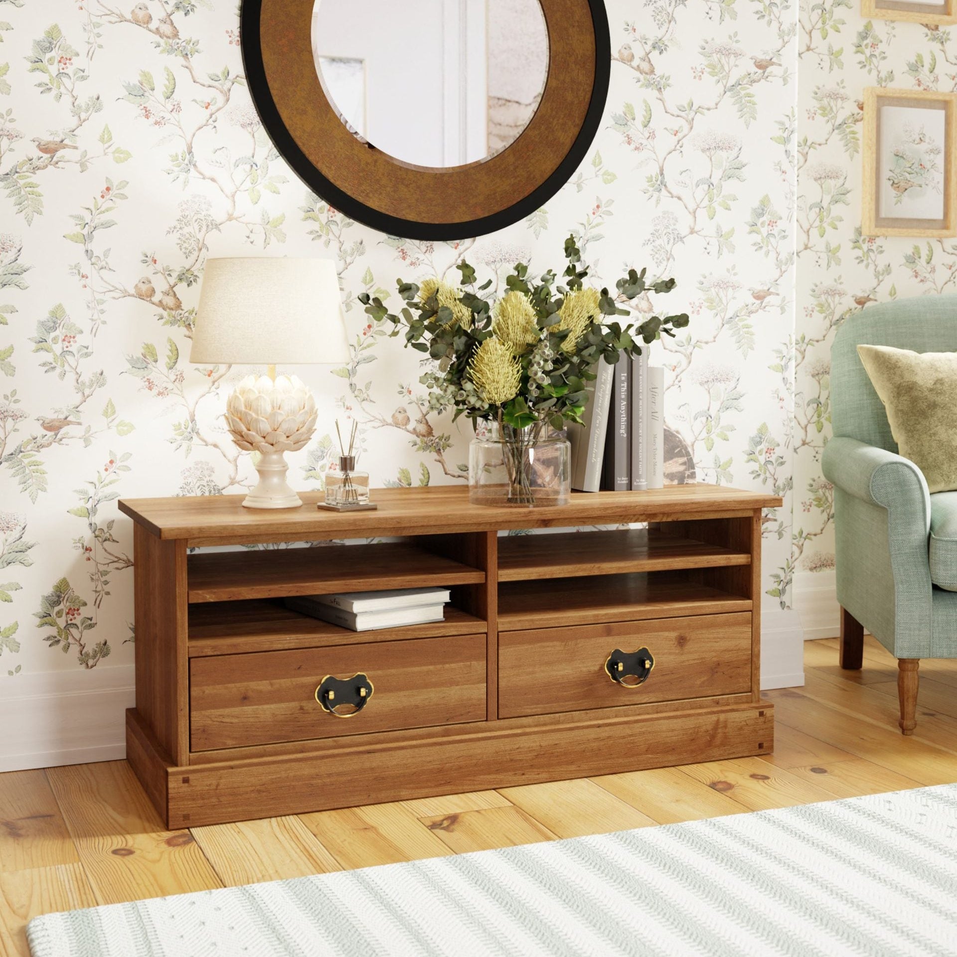 Laura Ashley TV cabinet with 4 shelves and 2 storage drawers with metal handles from the Garrat Honey collection