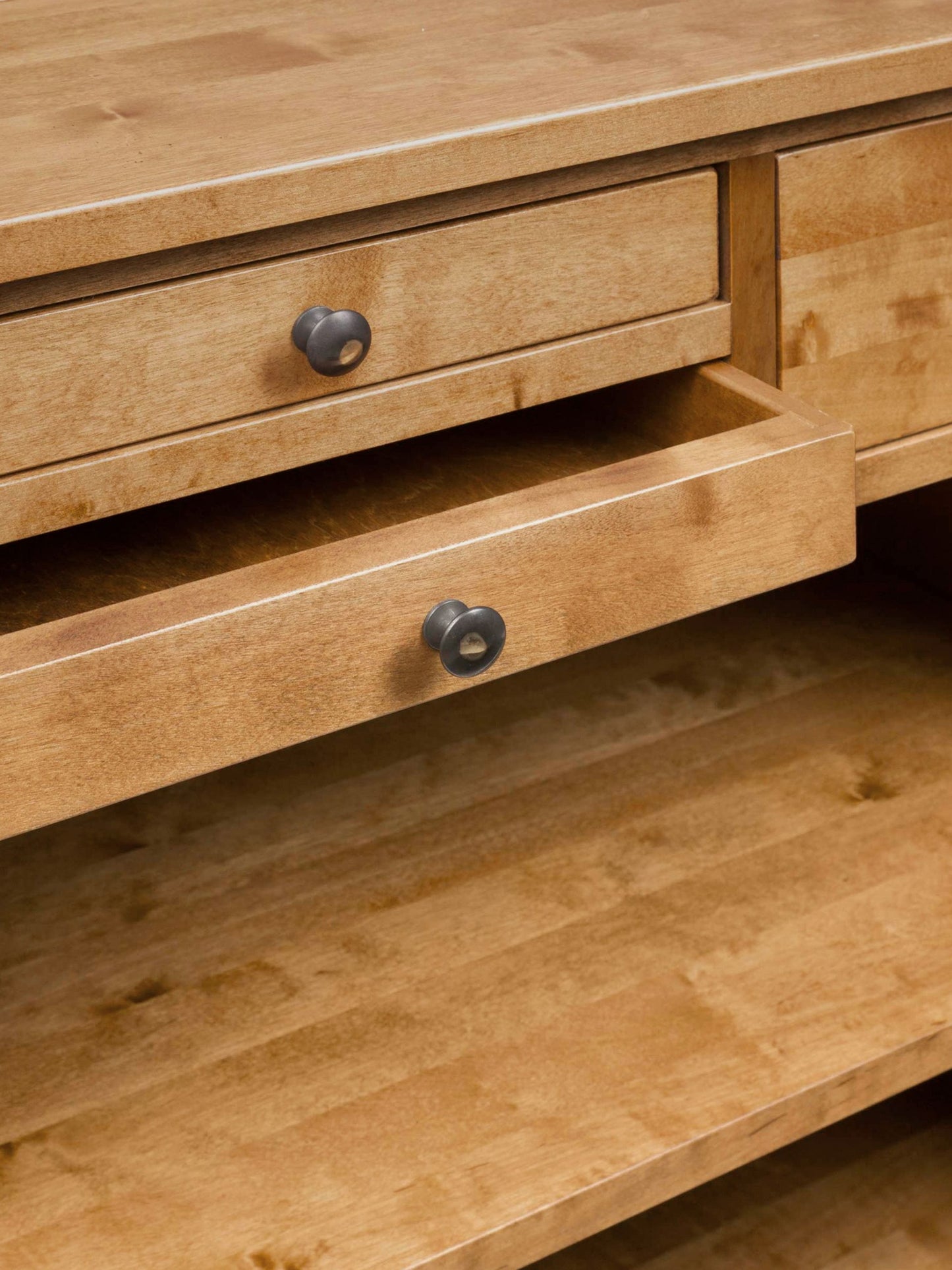 Laura Ashley Garrat Honey 4 Drawer Console Table features storage drawers with metal knobs and two shelves 