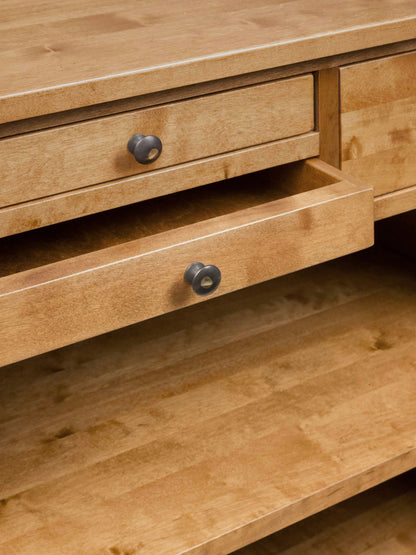 Laura Ashley Garrat Honey 4 Drawer Console Table features storage drawers with metal knobs and two shelves 