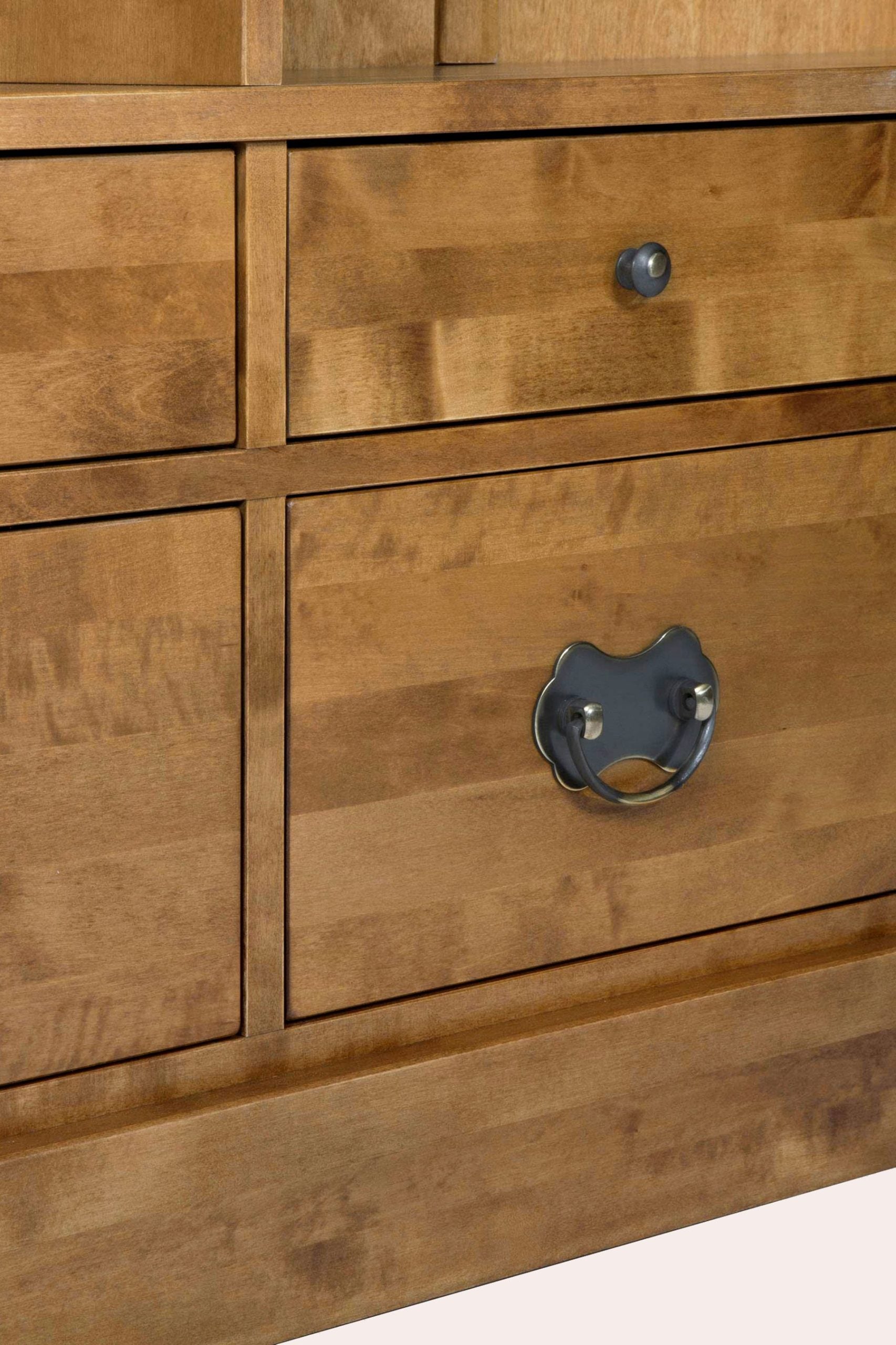 Laura Ashley Garrat Honey 4 Drawer Single Bookcase features 2 deep bottom storage drawers and 2 smaller lower drawers, all with metal handles