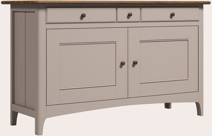 The Laura Ashley Hapton sideboard with Soft Truffle painted frame and Dark Chestnut top, two cupboard doors and three drawers in a Shaker style with matching dark wood handles.