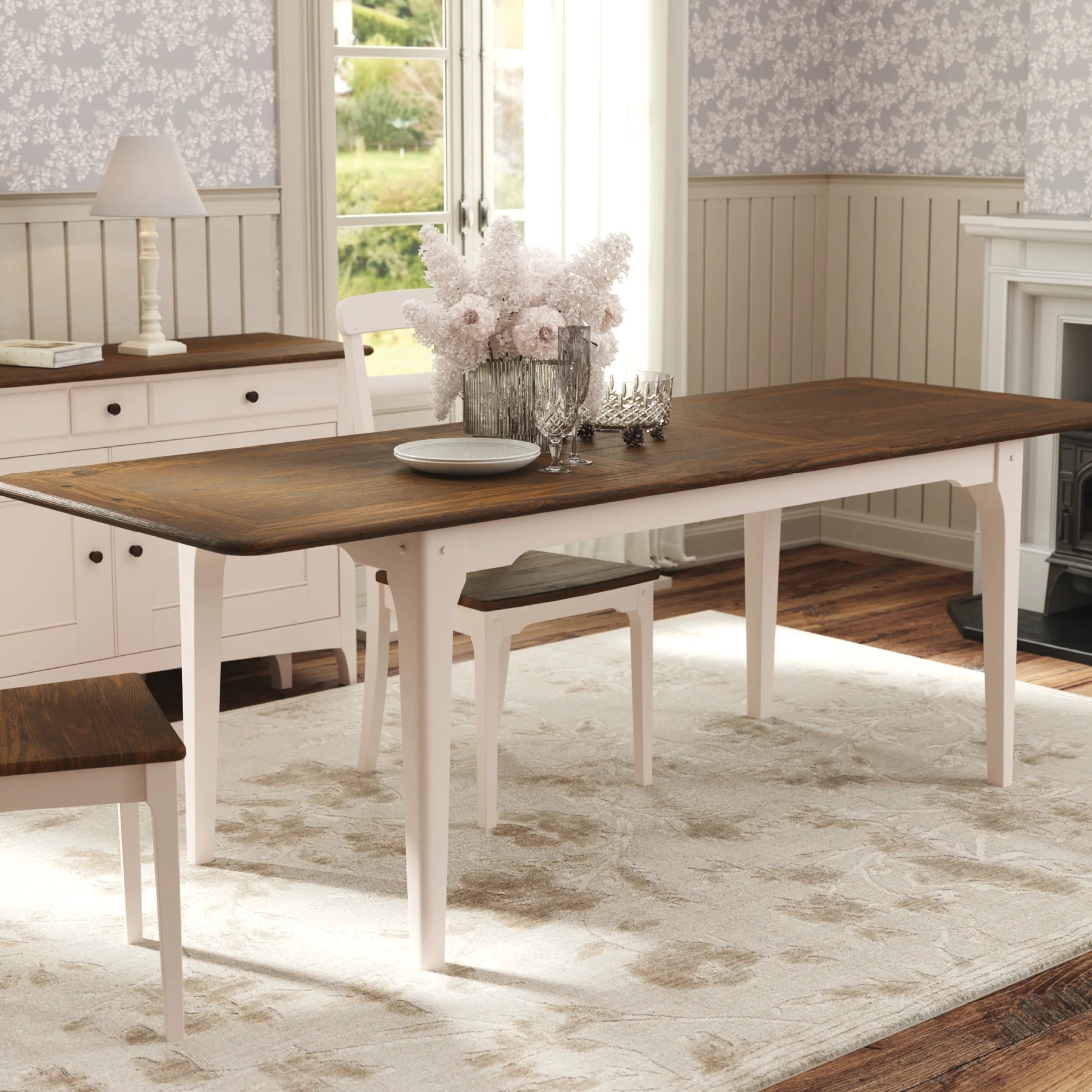 The Laura Ashley extending dining table from the Hapton range has a dark wood top and soft truffle coloured legs and can seat from 6-8 people, matching chairs are available