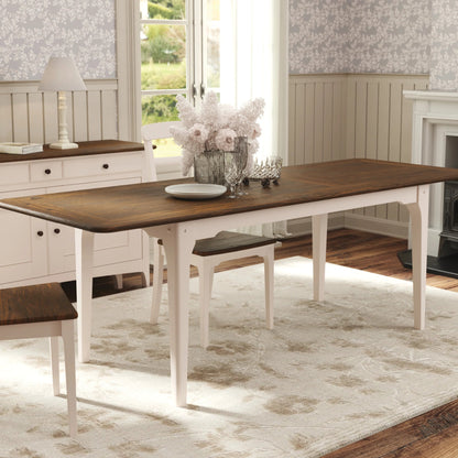 The Laura Ashley extending dining table from the Hapton range has a dark wood top and soft truffle coloured legs and can seat from 6-8 people, matching chairs are available