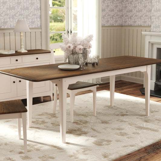 The Laura Ashley extending dining table from the Hapton range has a dark wood top and soft truffle coloured legs and can seat from 6-8 people, matching chairs are available
