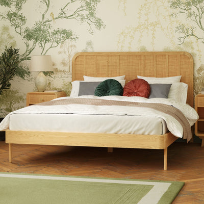 Laura Ashley Millen bed crafted from solid oak and oak veneers with distinctive rattan panel headboard, mid century modern style