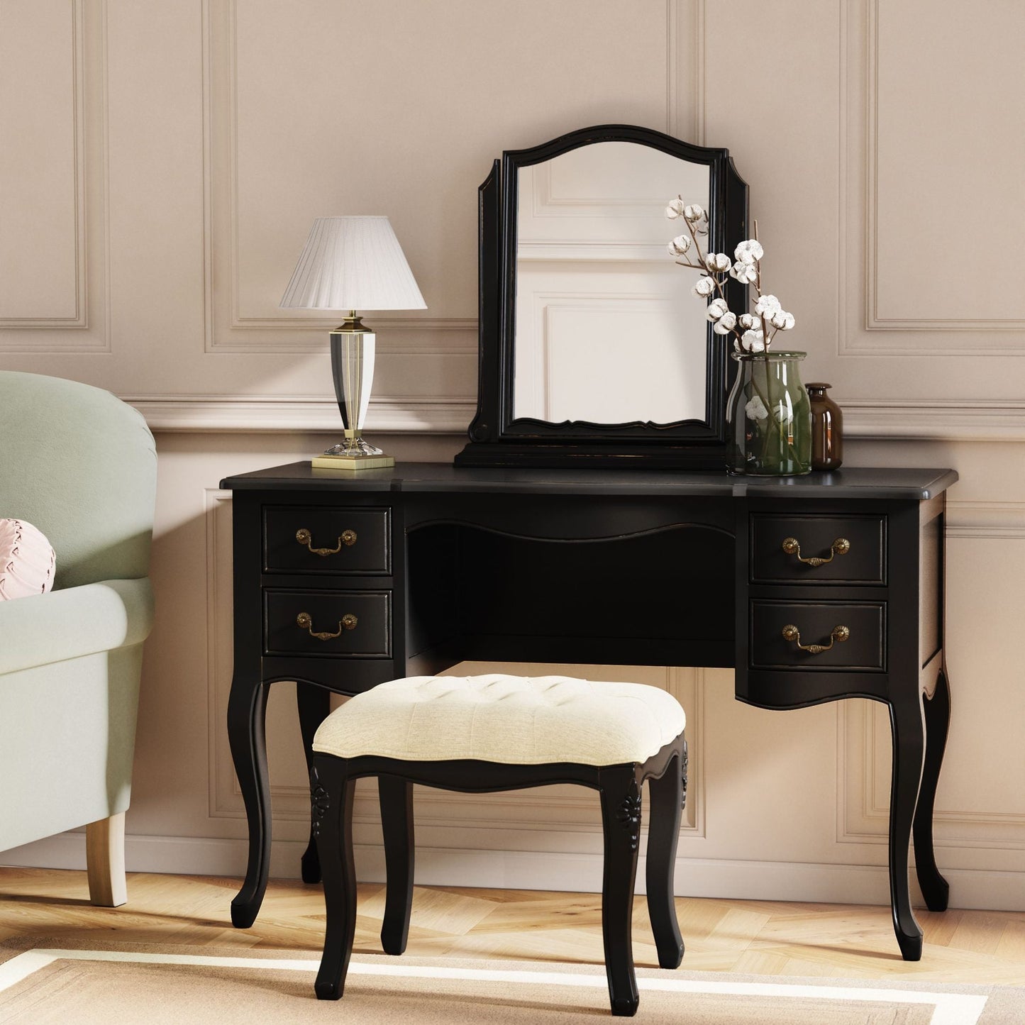 The Laura Ashley Black Dressing Table and Stool Set from the Montpellier bedroom collection includes an upholstered stool and dressing table with 4 drawers