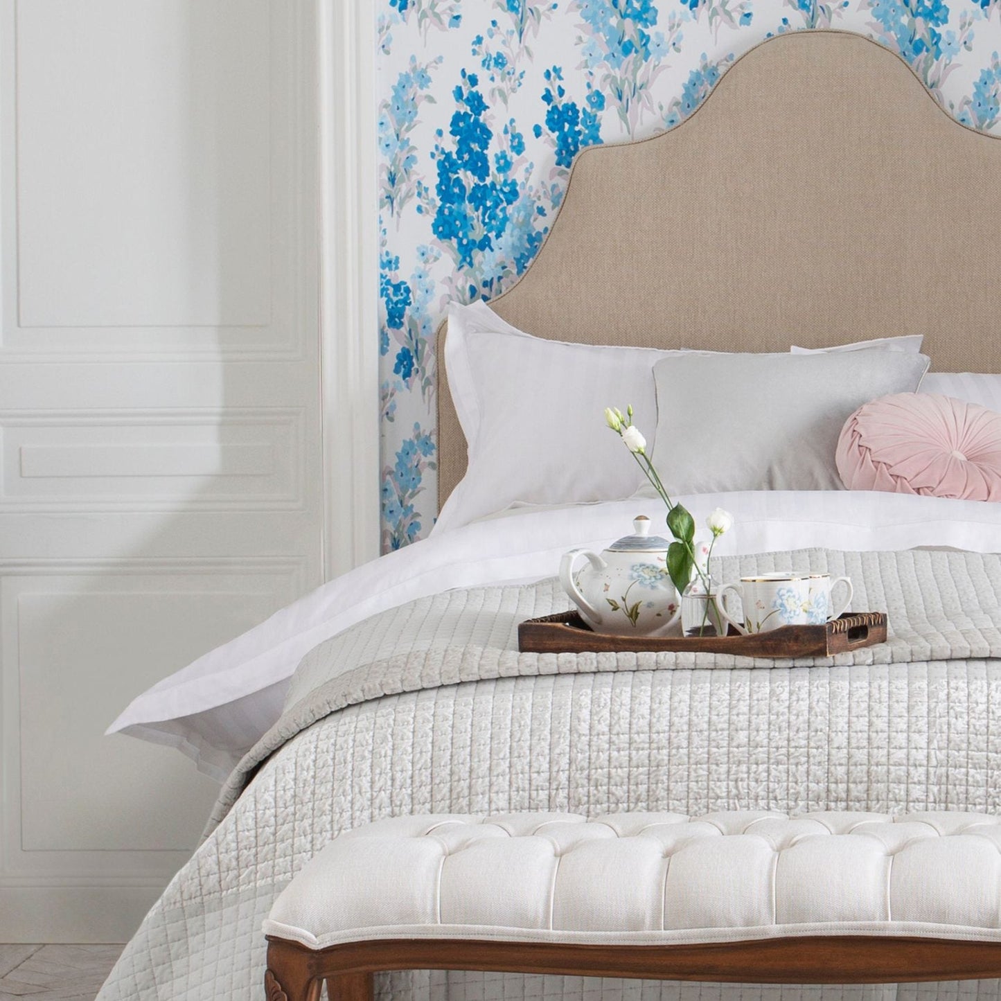 The Montpellier Upholstered Bench from Laura Ashley is a luxurious piece of furniture that complements this bedroom collection perfectly  