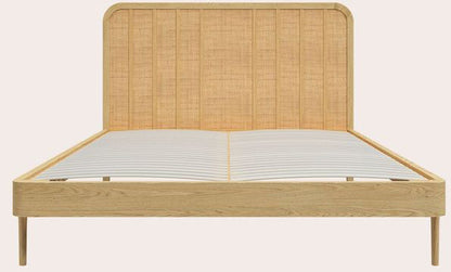 Laura Ashley Millen 4ft 6 double bed frame made from oak wood and veneers with a rattan headboard