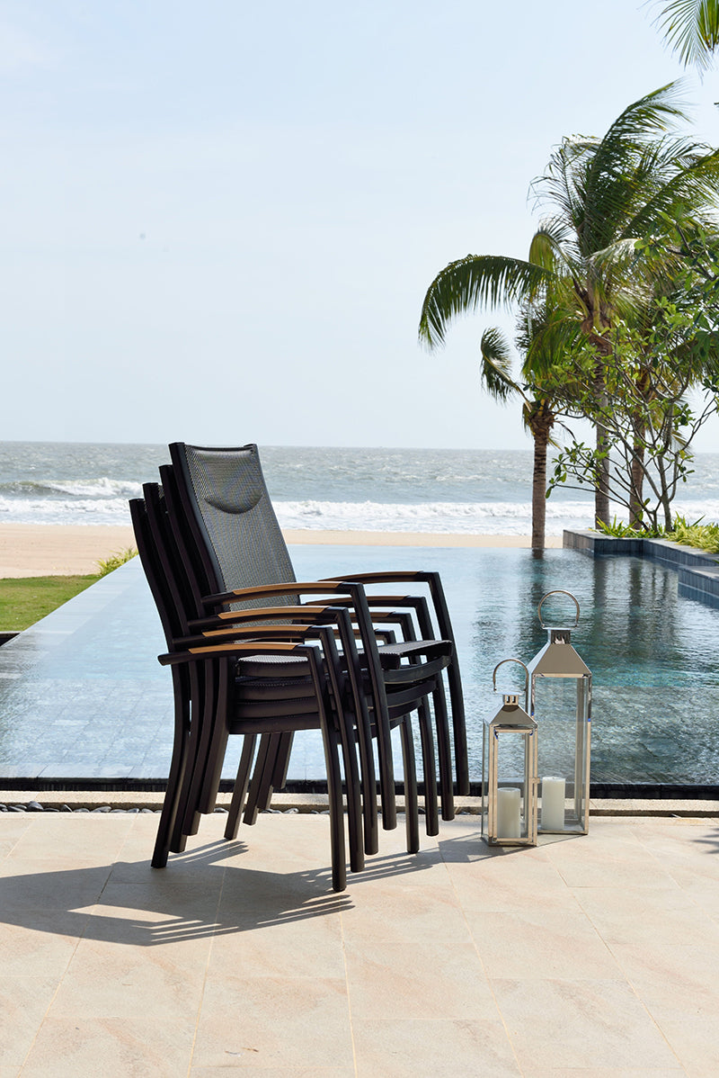 Panama 6 Seat Dining Set features a rectangular wood effect table with aluminium frame, and 6 high back armchairs with textilene seats that can be stacked when not in use