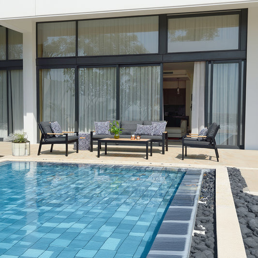 Panama Lounge Set in Black features a 3 seater sofa, 2 armchairs and a coffee table. With black aluminium frames, wood effect table top and armrest details and grey padded seat cushions