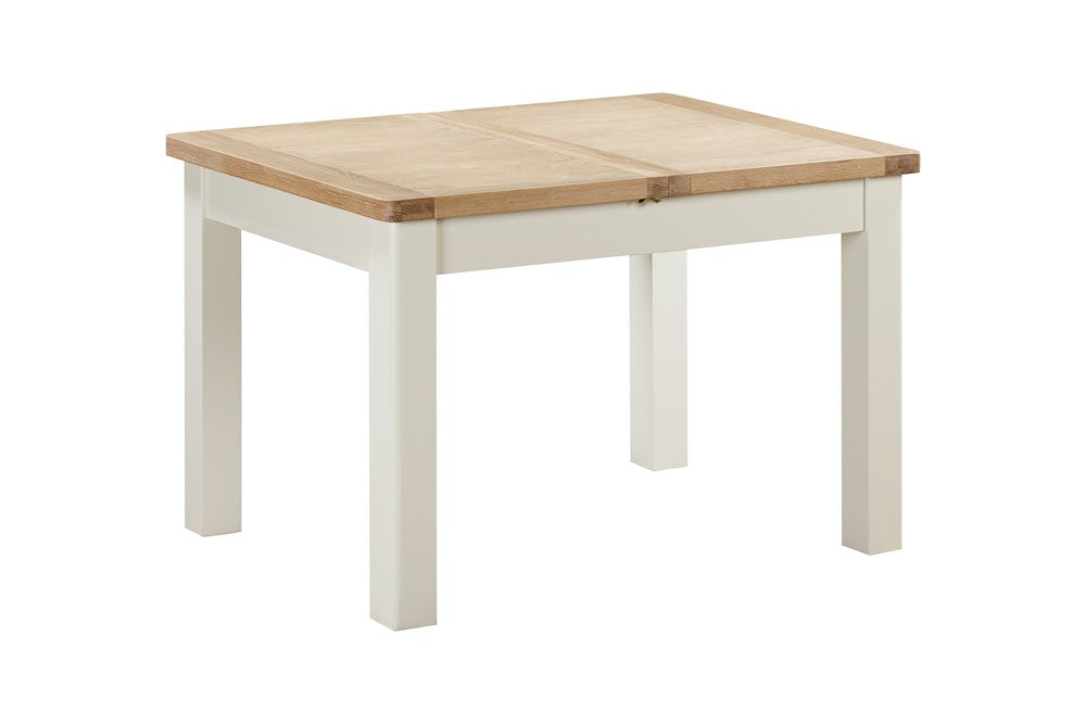 Papaya Foxington 120cm-153cm Extending Dining Table in an off white painted wood with natural oak table top, the extending leaf sits neatly within the table, seating 4-6 guests