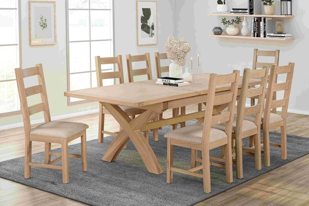The Papaya Foxington 180cm-240cm Extending Dining Table can seat 8-10 people and features a striking cross frame leg in a solid Natural Oak wood, the extension leaves store neatly with the table 