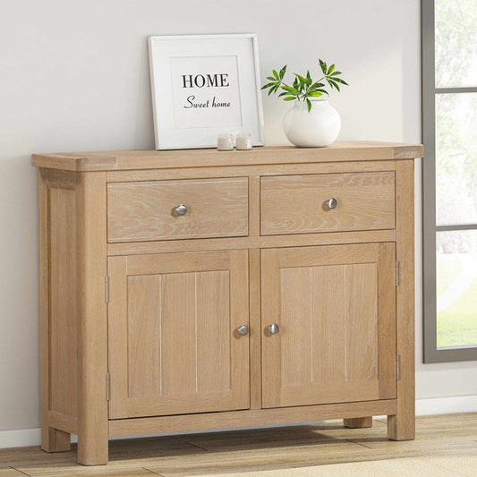 Papaya Foxington natural solid oak sideboard with two cupboard doors and two upper storage drawers and silver handles