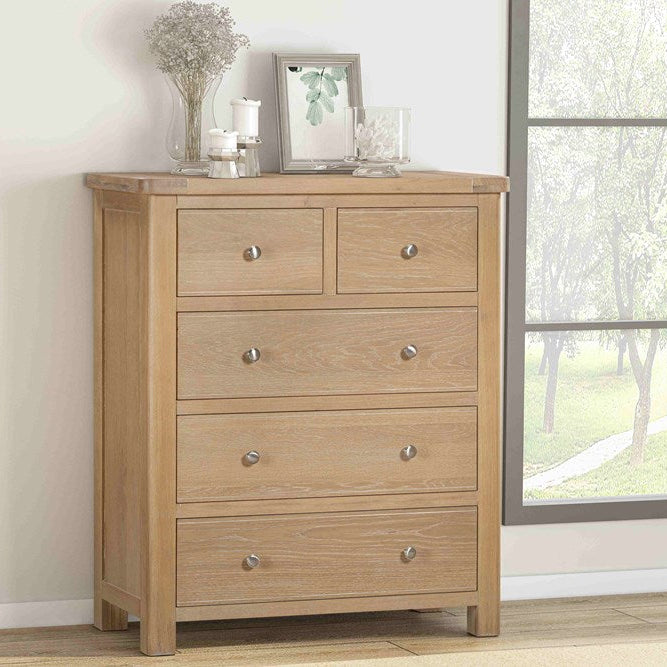 Papaya Foxington 5 Drawer Chest in  Natural Oak features 2 top drawers and 3 larger drawers beneath all with silver colour drawer knobs