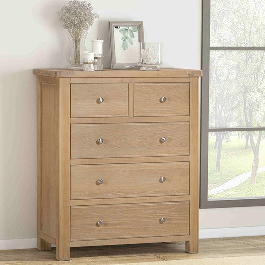 Papaya Foxington 5 Drawer Chest in  Natural Oak features 2 top drawers and 3 larger drawers beneath all with silver colour drawer knobs