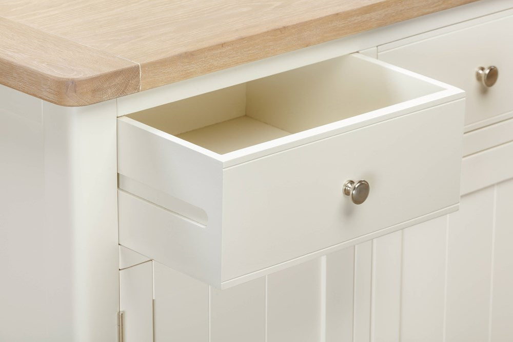 Papaya Foxington 3 Door 3 drawer Sideboard crafted from an off white painted wood with natural oak top, with silver drawer knobs